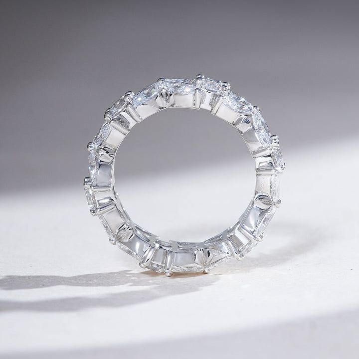 Profile view of the 5.5 Ct Eternity Band with continuous floral motifs crafted in polished white gold.