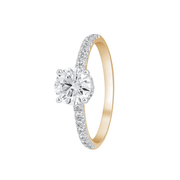 Angled view of Forever Ring showing the pear solitaire and pavé-set diamonds along the band.