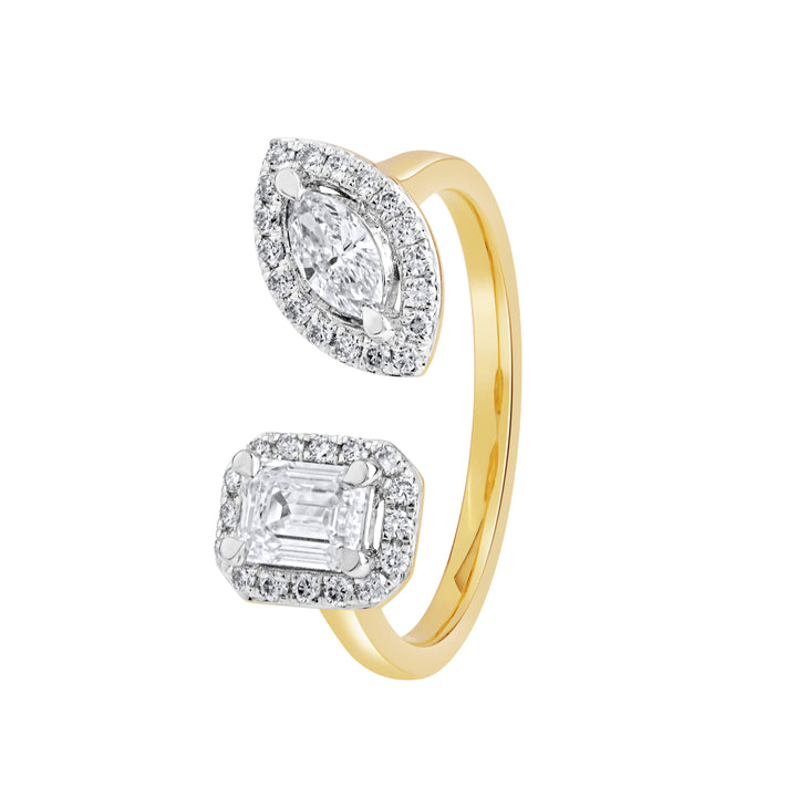 Angled view of the yellow gold Toi Et Moi ring with marquise and emerald-cut diamond halos.