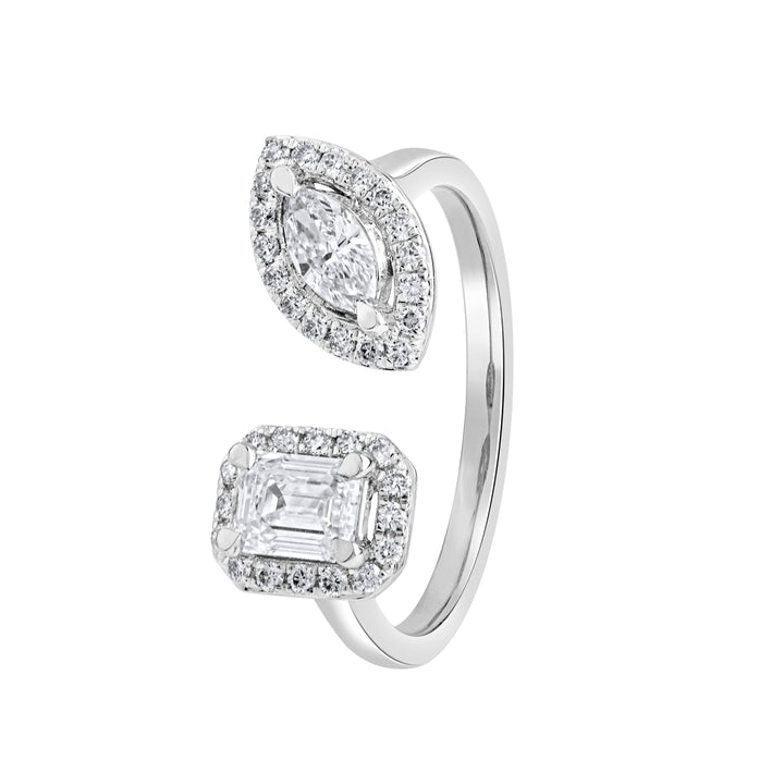 Angled view of the White gold Toi Et Moi ring with marquise and emerald-cut diamond halos.