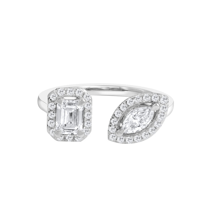 A White gold Toi Et Moi ring featuring a marquise-cut diamond and an emerald-cut diamond, each encircled by a halo of smaller diamonds.