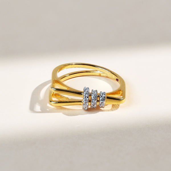 Geometric gold ring with triple diamond bar design and openwork sides