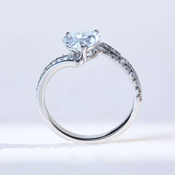 Profile view of Glowing Heart 1 Ct Solitaire Ring with diamond-studded band.