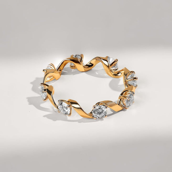 Overhead view of Goldvine 1.2 Ct Eternity Band in yellow gold with continuous vine-inspired diamond setting.