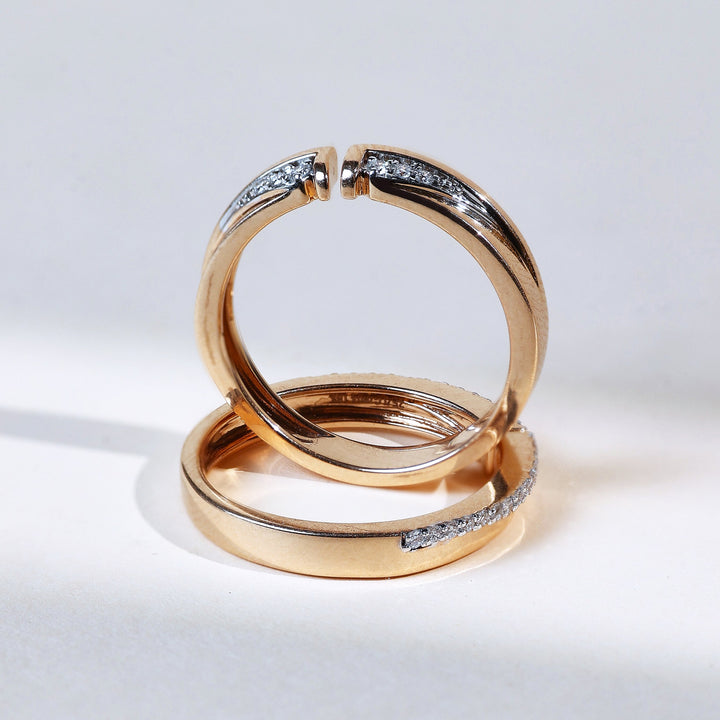 Stacked presentation of the ring pair, showcasing symmetry and dailywear appeal.