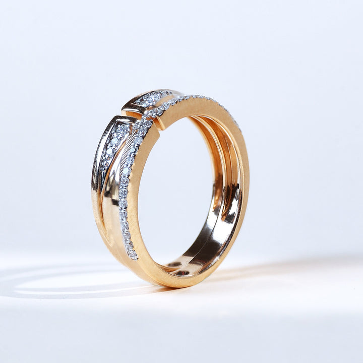 Tilted perspective highlighting rose gold finish and stone-set arcs.