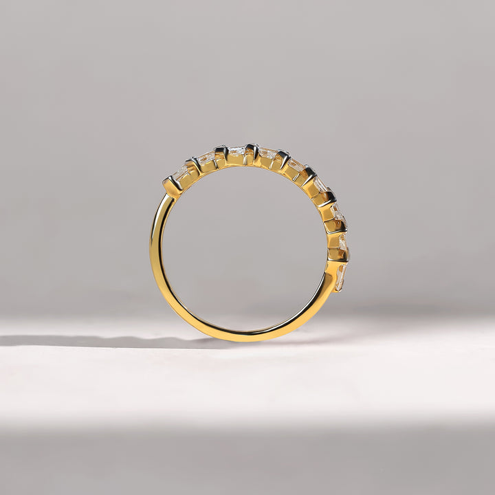 Vertical view of 0.7 Ct Half Chevron Dailywear Ring in gold with baguette diamonds