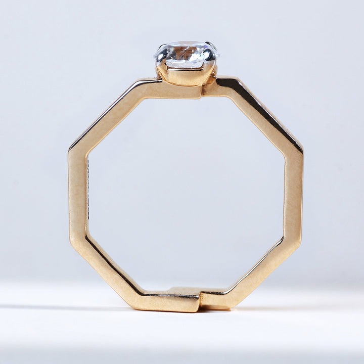 Hexa 0.7 Ct solitaire ring, profile view with clean octagonal band silhouette