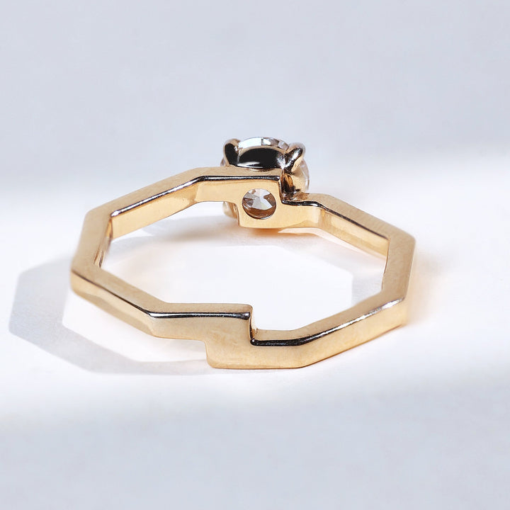 Hexa 0.7 Ct solitaire ring, angled overhead showing hexagonal band and diamond mount