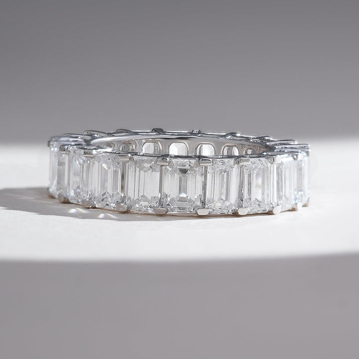 Front view of the Iconic 6 Ct Emerald Eternity Band showcasing flawless emerald-cut diamonds set in white gold.
