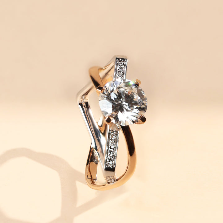 Side view of Illusion 2 Ct solitaire diamond ring with crossover band in rose and white gold.