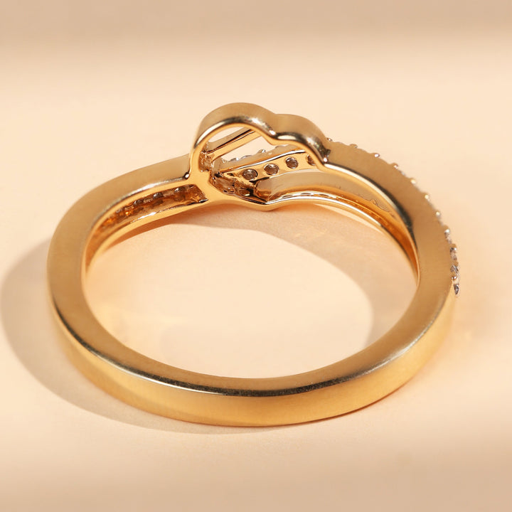 Back view of In Your Heart Promise Ring in polished yellow gold with heart accent.