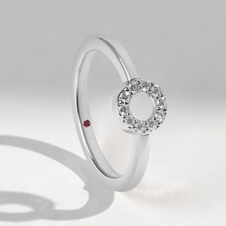 Flat lay of 0.1 Ct Little Halo Ring highlighting circular diamond halo design