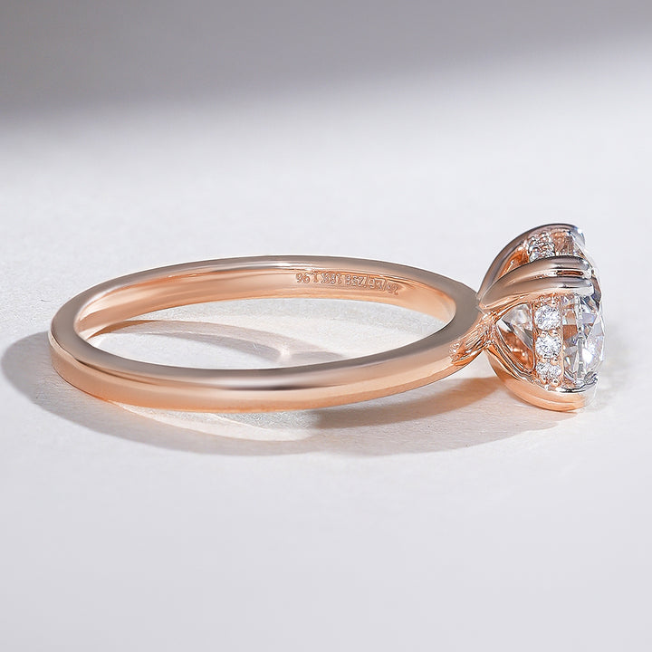 Side view of the Lysara 1.8 Ct Oval Solitaire Ring showcasing the slim rose gold band and hidden halo detail.