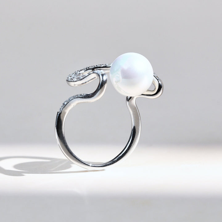 Side profile of Mystic Pearl diamond and pearl ring in white gold