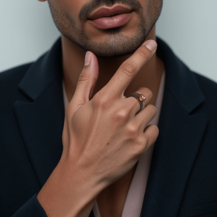 Man wearing 0.5 Ct Obsidian Flame Titanium Ring, styled with a suit for a bold look.