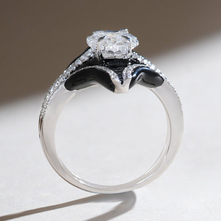 Profile view of Onyx Bloom ring showing elevated center setting with black onyx inlay