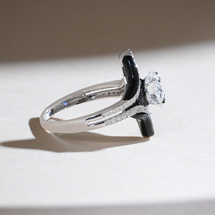 Side profile of Onyx Bloom ring highlighting the split shank with pavé diamonds and black onyx detailing.