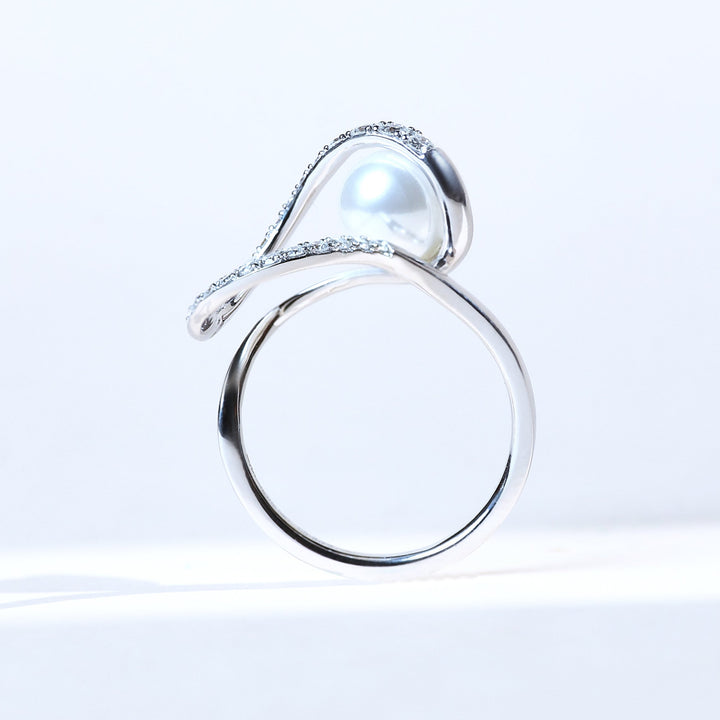 Side profile of Pearly Wave pearl and diamond ring in white gold