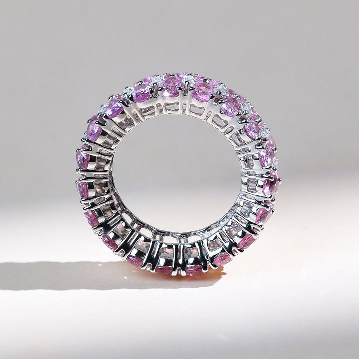 Circular profile of Pink Pear and Marquise Eternity Band showing intricate gem setting