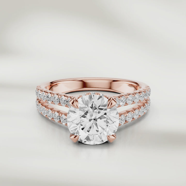 360 degree video 1 Ct Eira Solitaire Ring in rose gold, its round brilliant diamond catching the light with every movement.