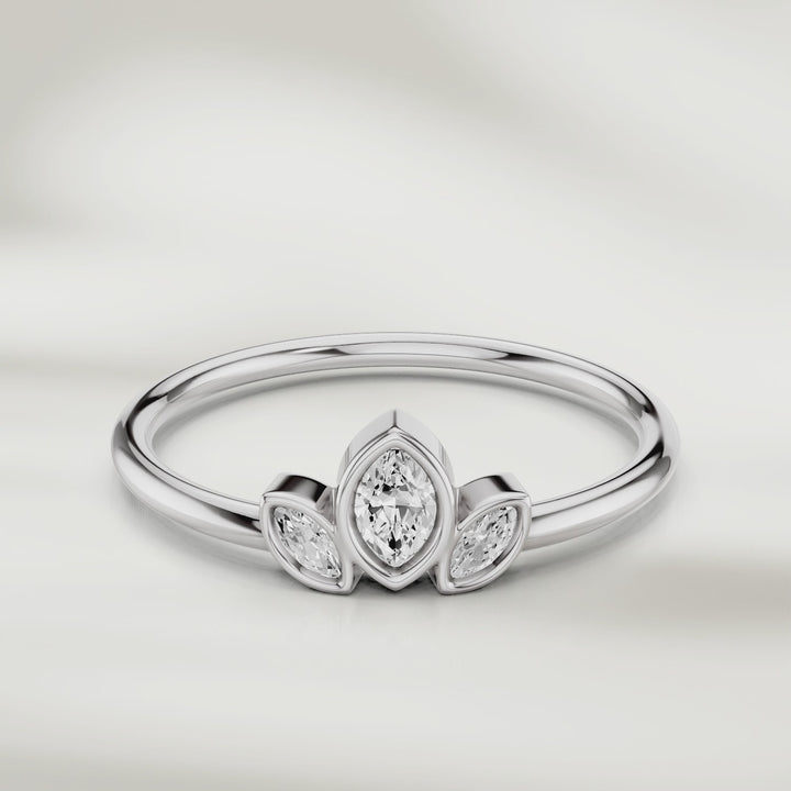 360-degree video of three marquise diamond cluster ring in gold with slim polished band and petal-inspired setting
