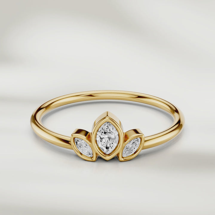 360-degree video of three marquise diamond cluster ring in gold with slim polished band and petal-inspired setting