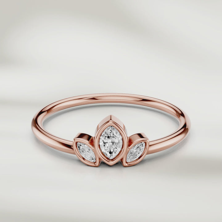 360-degree video of three marquise diamond cluster ring in gold with slim polished band and petal-inspired setting