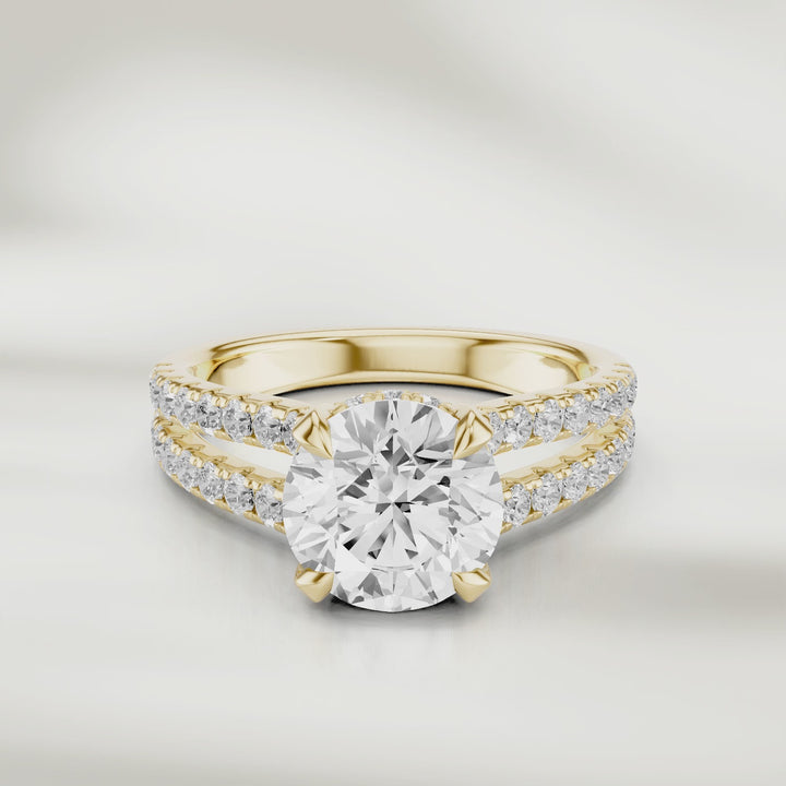 1 Ct Eira Solitaire Ring in champagne gold, its round brilliant diamond catching the light with every movement.