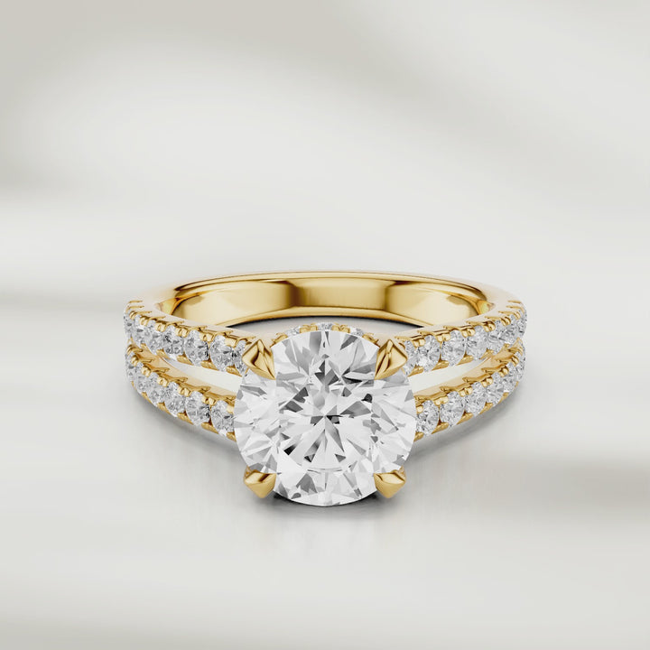 360 degree view of 1 Ct Eira Solitaire Ring in yellow gold, its round brilliant diamond catching the light with every movement.