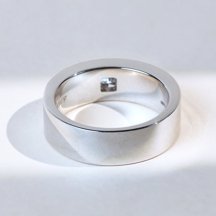 Back design of Prince men’s solitaire ring in white gold with clean minimal finish.