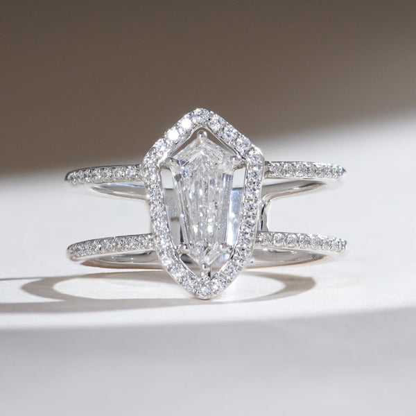 Front view of the Prism Gaze 0.7 Ct Shield Diamond Cocktail Ring with a halo of pavé diamonds on a split shank band