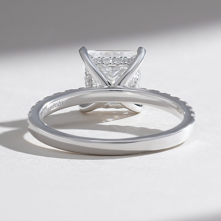 Rear view of the Radiant Glory 2 Ct Princess Solitaire Ring showing the slim pavé diamond band and open gallery.