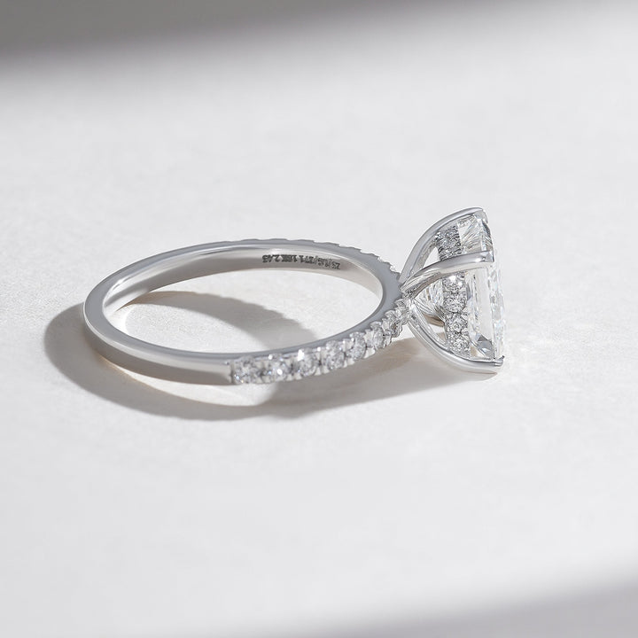 Side profile of the Radiant Glory 2 Ct Princess Solitaire Ring showcasing the prong setting and pavé diamonds.