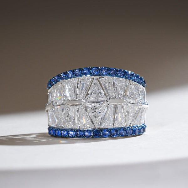 Front view of the Radiant Horizon 2 Ct Fancy Cocktail Ring with baguette-cut diamonds and blue sapphire borders in white gold.