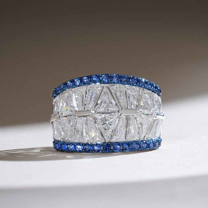 Front view of the Radiant Horizon 2 Ct Fancy Cocktail Ring with baguette-cut diamonds and blue sapphire borders in white gold.