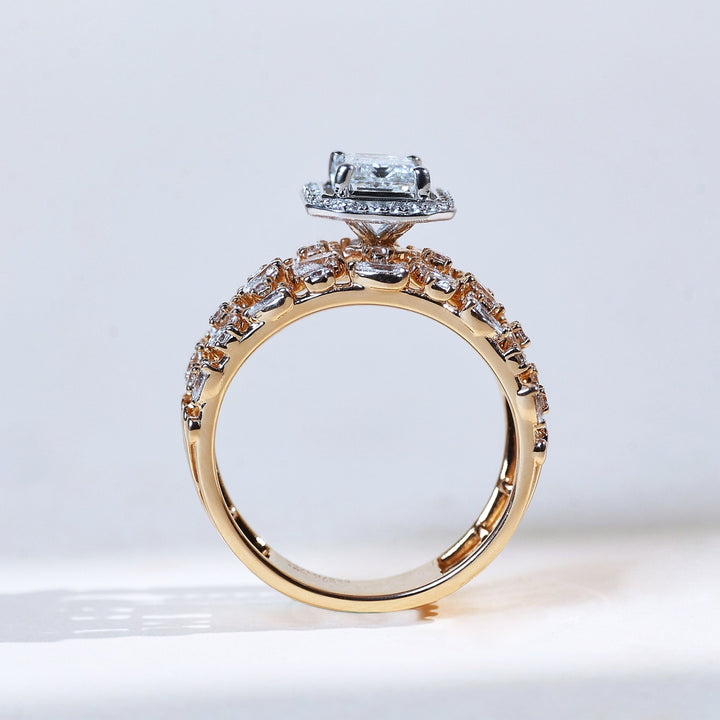 Side profile of Raindrop 1 ct emerald halo solitaire diamond ring in yellow gold