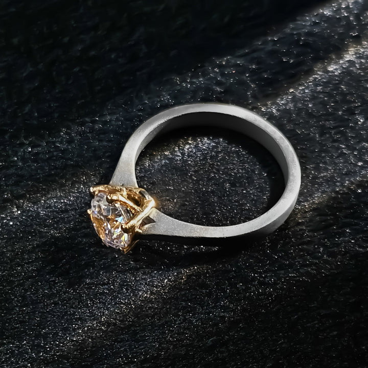 Top view of 1 Ct Regal Titanium Ring with round solitaire diamond on matte titanium band.