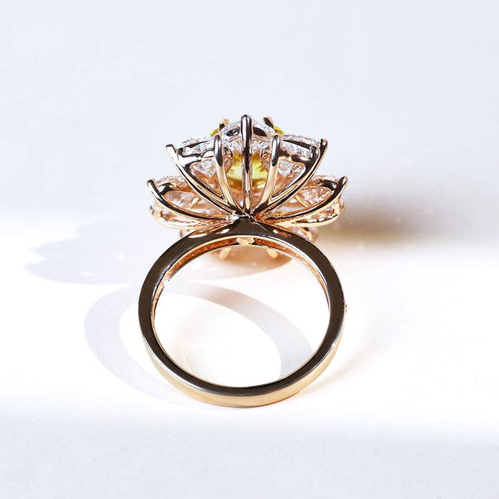 Underside craftsmanship of ornate gold cocktail ring with diamond floral design.