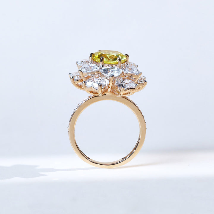 Side profile of Regalia Ornate Cocktail Ring with elevated gemstone setting in yellow gold.