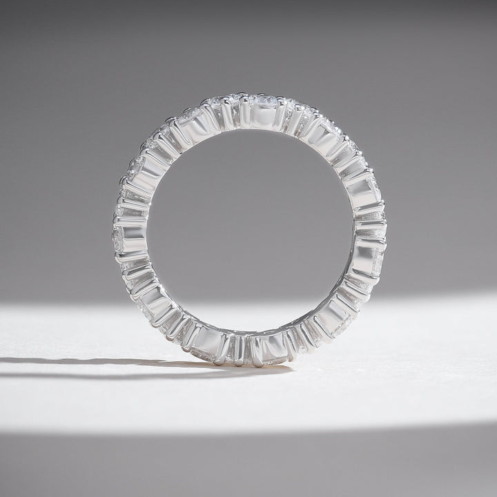 Top profile of white gold round diamond eternity ring with seamless full-circle brilliance.