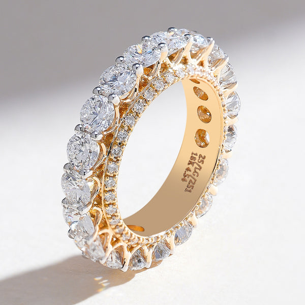 Side standing view of 4.5 Ct round diamond eternity band in yellow gold, showcasing prong setting and inner diamond detailing.