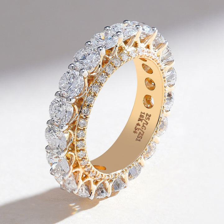 Side standing view of 4.5 Ct round diamond eternity band in yellow gold, showcasing prong setting and inner diamond detailing.