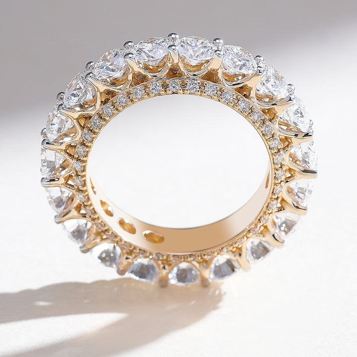 Top profile of 4.5 Ct round diamond eternity band in yellow gold, highlighting diamond brilliance and full-circle symmetry.