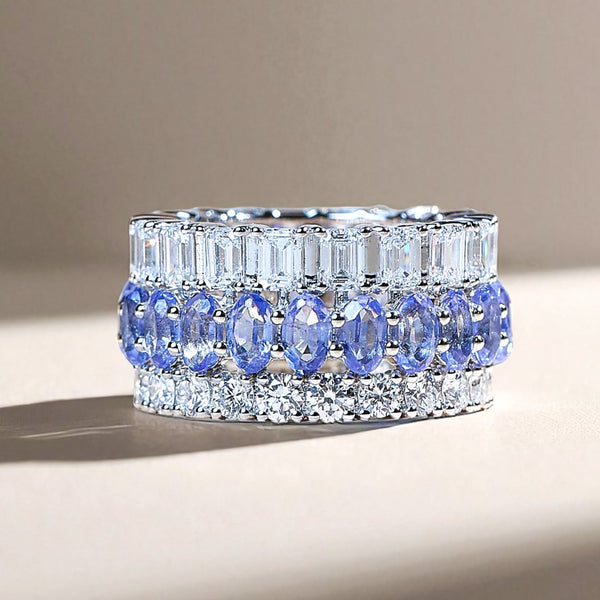 Royal Blue Crown 5.8 ct eternity band with oval blue sapphires and baguette diamonds in white gold