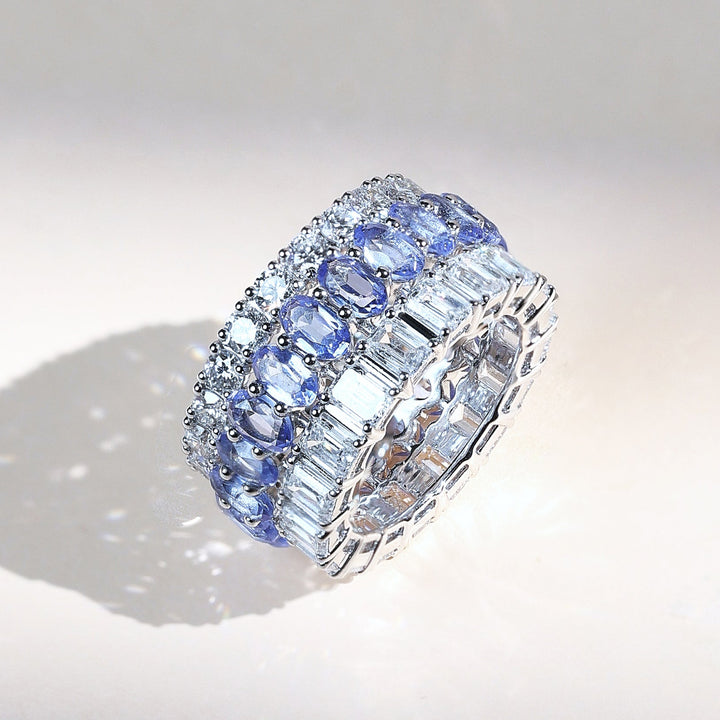 Angled view of Royal Blue Crown eternity band with blue sapphires and diamonds in white gold