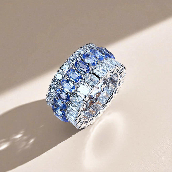 Angled view of Royal Blue Crown eternity band with blue sapphires and diamonds in white gold