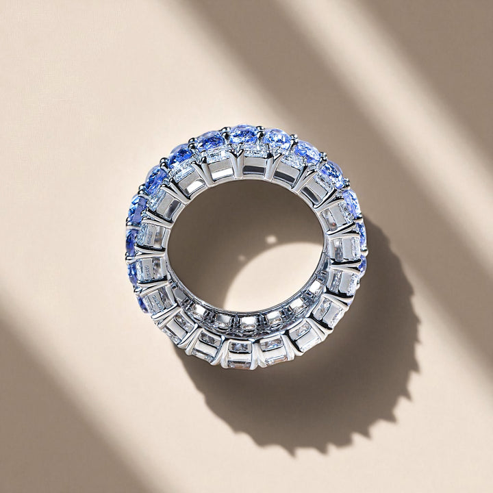 Side profile of Royal Blue Crown sapphire and diamond eternity band in white gold