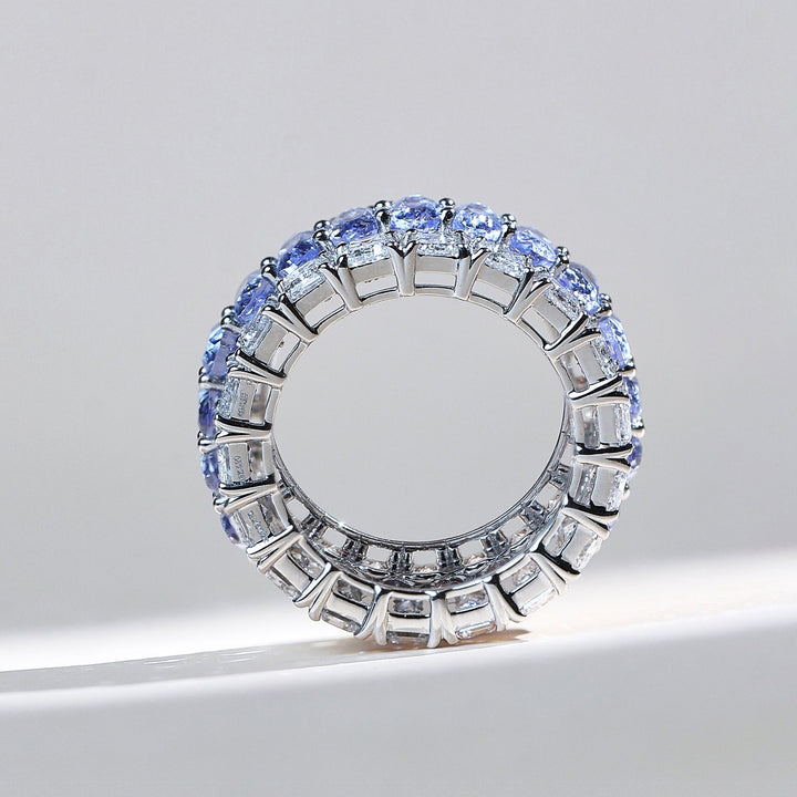 Side profile of Royal Blue Crown sapphire and diamond eternity band in white gold