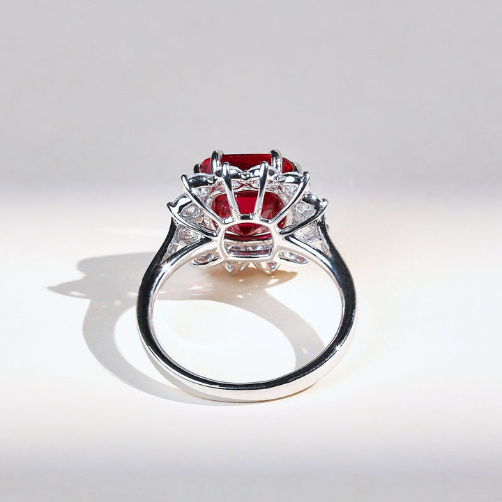 Back view of Ruby Embrace cocktail ring with ruby center stone and diamond accents